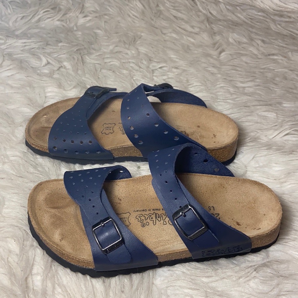 Birki’s navy perforated leather 2 buckle strap Freeport sandals